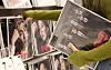 A person grabs BTS's album ″Arirang″ at a K-pop merchandise store in central Seoul on April 13. [NEWS1]