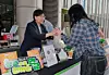 Health Minister Jeong Eun-kyeong hands a student a cup of coffee as the ministry visits Soongsil University meet with university students and introduce the national pension fund on May 13. [MINISTRY OF HEALTH AND WELFARE]