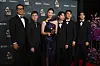 The cast and crew of 'KPop Demon Hunters' (2025) pose in the press room with the award for the best song written for visual media for 'Golden' (2025) during the 68th annual Grammy Awards in Los Angeles on Feb. 1. [AP/YONHAP]