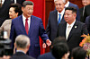 Chinese President Xi Jinping, left, and North Korean leader Kim Jong-un arrive for a reception marking the 80th anniversary of the end of World War II at the Great Hall of the People in Beijing on Sept. 3, 2025. [REUTERS/YONHAP]