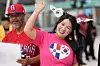 A supporter of the Korean baseball team arrives for a World Baseball Classic game between the Dominican Republic and Korea in Miami on March 13. (AP Photo/Lynne Sladky)