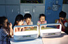 Students at Giseong Elementary School in Uljin, North Gyeongsang, pray for the seeds planted in the LG Tiiun Mini to grow strong and healthy. [LG ELECTRONICS]