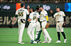 Australia's pitcher Jon Kennedy, left, celebrates with teammates after they beat Chinese Taipei at a World Baseball Classic game in Tokyo on March 5. [AP/YONHAP]