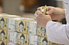 Korean 50,000 won bills are stacked inside a bank in Seoul on Oct. 24, 2022. [YONHAP]