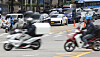 Delivery workers drive past a street in Gangnam District, southern Seoul, on June 17, 2025. [YONHAP]