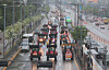 Agricultural tractors driven by farmers occupy traffic lanes in downtown Seoul during a rally on May 10, 2025. [YONHAP]