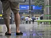 A group of people hold umbrella as rain drenches the southern Seoul on May 20. [NEWS1]
