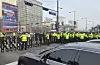 Police close traffic lanes as members of the Solidarity Against Disability Discrimination stage a protest near Gwanghwamun Station in central Seoul on March 27. [YONHAP]