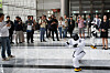Visitors take pictures of a humanoid robot dancing inside the COEX convention center in southern Seoul, in this file photo taken April 7. [YONHAP]