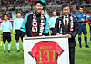 Football player Son Heung-min, left, and Korea Football Association President Chung Mong-gyu pose for a photo after receiving a commemorative jersey ahead of a friendly match between Korea and Paraguay at Seoul World Cup Stadium in Mapo District, western Seoul, on Oct. 14, 2025. [NEWS1]