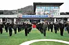 Newly commissioned officers and attendees salute the national flag at the 80th graduation ceremony of the Republic of Korea Naval Academy at its parade ground in Changwon, South Gyeongsang on Feb. 27. [YONHAP]