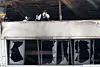 Firefighters are seen conducting search operations inside an Anjun Industrial auto parts manufacturing factory in Daedeok District, Daejeon, on March 21, after a fire broke out on March 20. [YONHAP]