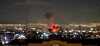 Fireballs are seen after reported strikes near the Islamic Republic of Iran Broadcasting headquarters in Tehran, Iran on March 1. [REUTERS/YONHAP]