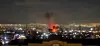 Fireballs are seen after reported strikes near the Islamic Republic of Iran Broadcasting headquarters in Tehran, Iran on March 1. [REUTERS/YONHAP]