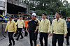 Labor Minister Kim Young-hoon, second from left, speaks with Prime Minister Kim Min-seok at the site where an explosion happened at Hanwha Aerospace's plant in Daejeon on June 1. [YONHAP]