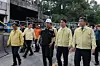 Labor Minister Kim Young-hoon, second from left, speaks with Prime Minister Kim Min-seok at the site where an explosion happened at Hanwha Aerospace's plant in Daejeon on June 1. [YONHAP]