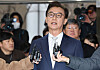 Former Oceans Minister Chun Jae-soo appears at the Seoul Seodaemun Police Station in Seoul on Dec. 19, 2025, to undergo questioning over allegations he took bribes from the Unification Church. [YONHAP]