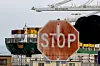 A view of cargo ship with shipping containers at the port of Oakland. [REUTERS]