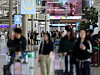 Travels make their way through the arrivals hall at Incheon International Airport on May 1. [NEWS1]