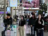 Travels make their way through the arrivals hall at Incheon International Airport on May 1. [NEWS1]