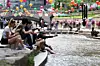 People rest by the water along Cheonggyecheon in central Seoul on May 18, when daytime temperatures climbed to around 30 degrees Celsius (86 degrees Fahrenheit) across much of the country. [YONHAP]