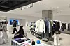 Foreign customers browse through products at “Kinetic Ground,” a K-fashion specialty section located inside the main branch of Lotte Department Store in Jung District, central Seoul, in this undated photo. [JOONGANG ILBO]