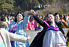Members of the Socialist Women's Union, North Korea's largest women's organization, dance in a ball in Pyongyang on March 8, marking International Women's Day, in this photo published by the Korean Central News Agency the following day. [YONHAP]