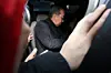 The director of Saekdongwon, center, is seen leaving the Seoul Central District Court in Seocho District, southern Seoul, on Feb. 19 after attending a pretrial detention hearing. Saekdongwon is a residential facility for people with developmental disabilities in Incheon. [YONHAP]