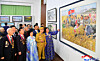 Visitors gather at an art exhibition to celebrate the birth of the regime founder Kim Il Sung in Pyongyang on April 9 in a photo carried by the Korean Central News Agency the following day. [YONHAP]