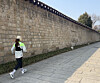 A runner sprints around the perimeter of Gyeongbok Palace in Jongno District, central Seoul, on March 17.  [ALICIA CARR]