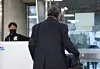 The director of Saekdongwon, center, is seen at Seoul Central District Court in Seocho District, southern Seoul, on Feb. 19 to attend a pretrial detention hearing. Saekdongwon is a residential facility for people with developmental disabilities in Incheon. [YONHAP]