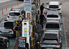 People fuel up their vehicles at a gas station in Seocho District, southern Seoul, on March 1. [YONHAP]