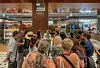 Foreign tourists visiting The Hyundai Seoul department store in Yeongdeungpo District, western Seoul, are listening to a guide during an English-language tour program in October 2023. [THE HYUNDAI SEOUL]