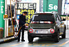 A driver is seen refueling his vehicle at a gas station in Seoul on April 15. [NEWS1]