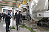 Public Procurement Service Administrator Baek Seung-bo, center, inspects the production process at City Oil Field on April 23. [PUBLIC PROCUREMENT SERVICE]