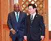 President Lee Jae Myung, right, welcomes Ghanaian President John Dramani Mahama at the Blue House in Jongno District, central Seoul, on March 11. [YONHAP]