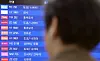 A passerby looks at the arrivals information board filled with flights headed to Japan at Incheon International Airport's Terminal 1 on Nov. 19, 2024. [NEWS1]
