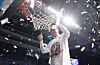 Busan KCC Egis head coach Lee Sang-min gives a thumbs-up after cutting down the net following KCC’s championship victory over the Goyang Sono Skygunners in Game 5 of the 2025-26 KBL finals at Goyang Sono Arena in Goyang, Gyeonggi, on May 13. [YONHAP]