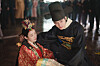 A still from the MBC drama ″Perfect Crown″ starring Byeon Woo-seok, right, and IU [MBC]