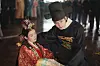 A still from the MBC drama ″Perfect Crown″ starring Byeon Woo-seok, right, and IU [MBC]