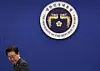 President Lee Jae Myung heads to his seat after the national pledge ceremony during a senior presidential secretaries’ meeting at Yeomin Hall of the presidential office on May 7. [YONHAP]