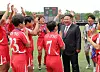 North Korean leader Kim Jong-un compliments the under-17 female footballers representing North Korea during a domestic exhibition match held in North Korea, in a photo carried by Rodong Sinmun on June 2. [YONHAP]