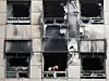 Police and fire authorities investigate a capsule hotel in Sogong-dong, Jung District, central Seoul, on March 15, where a fire injured 10 foreign nationals the previous day. [NEWS1]
