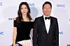 SK Group Chairman Chey Tae-won, right, and his partner Kim Hee-young attend a gala dinner hosted by the Louis Vuitton Foundation in Paris in November 2023. [JOONGANG ILBO]