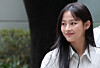 Minji of girl group NewJeans enters the Seoul Central District Court building in southern Seoul to attend a mediation session on Aug. 14, 2025. [NEWS1]