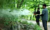 Seoul officials spray Bacillus thuringiensis israelensis, also known as BTI, an eco-friendly microbial control agent, and water at Sahmyook University in Nowon District, northern Seoul on May 7 to prevent the spread of lovebugs. [NEWS1]