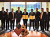 Posco International CEO Lee Kye-in, fifth from left, poses for a commemorative photo with attendees after signing an agreement with U.S.-based ReElement Technologies Corporation in Washington, D.C., on Thursday to pursue a joint venture for rare earth separation and refining production. [YONHAP]