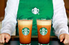 A Starbucks barista presents two cups of ″Aerocano″ [STARBUCKS KOREA]