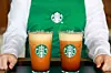 A Starbucks barista presents two cups of ″Aerocano″ [STARBUCKS KOREA]