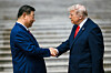 U.S. President Donald Trump, right, shakes hands with Chinese President Xi Jinping at the Great Hall of the People in Beijing, China, on May 14. [UPI/YONHAP]